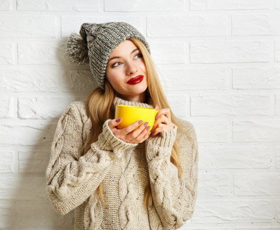Woman dressed for cold with Best Combinations of Hair Products
