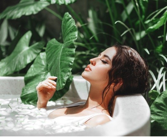 Woman enjoying a hair spa treatment