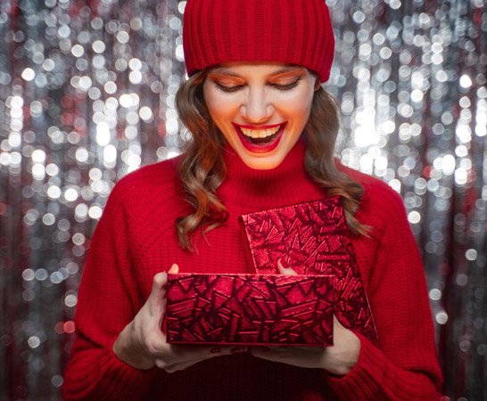 Woman holding christmas gift