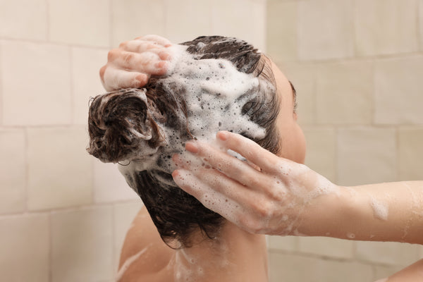How to Wash Your Hair Less in Summer Without It Getting Greasy