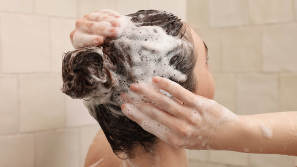How to Wash Your Hair Less in Summer Without It Getting Greasy